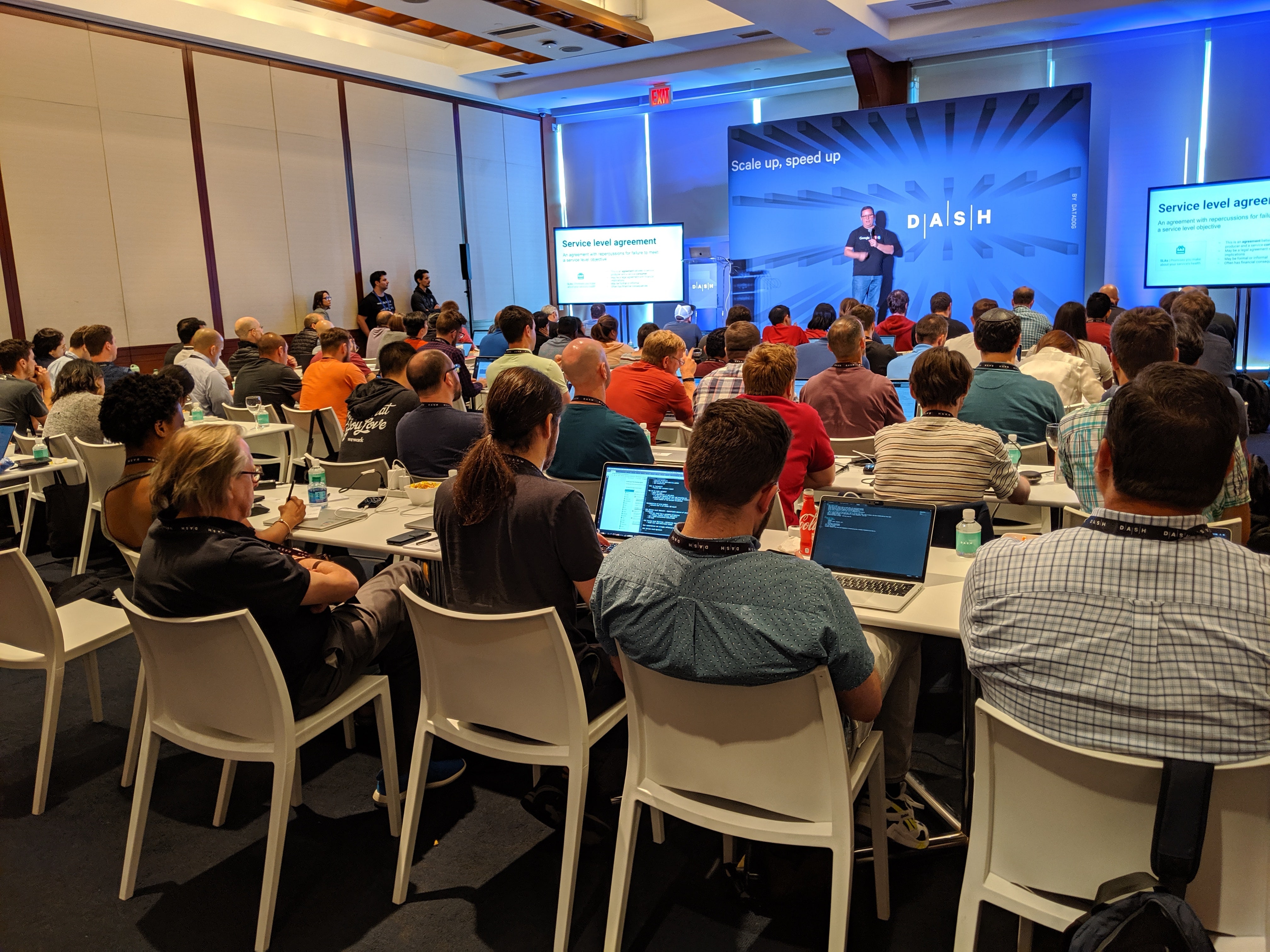 Attendees participate in Ensuring Reliability with SLOs, hosted by Datadog and Google.