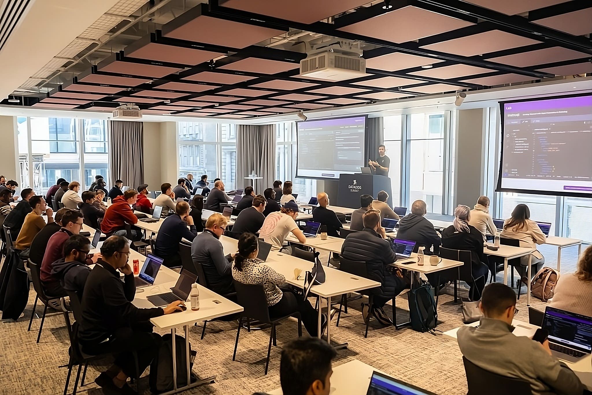 Presenter leading a technical workshop at a Datadog Summit. Presenter leading a technical workshop at a Datadog Summit.