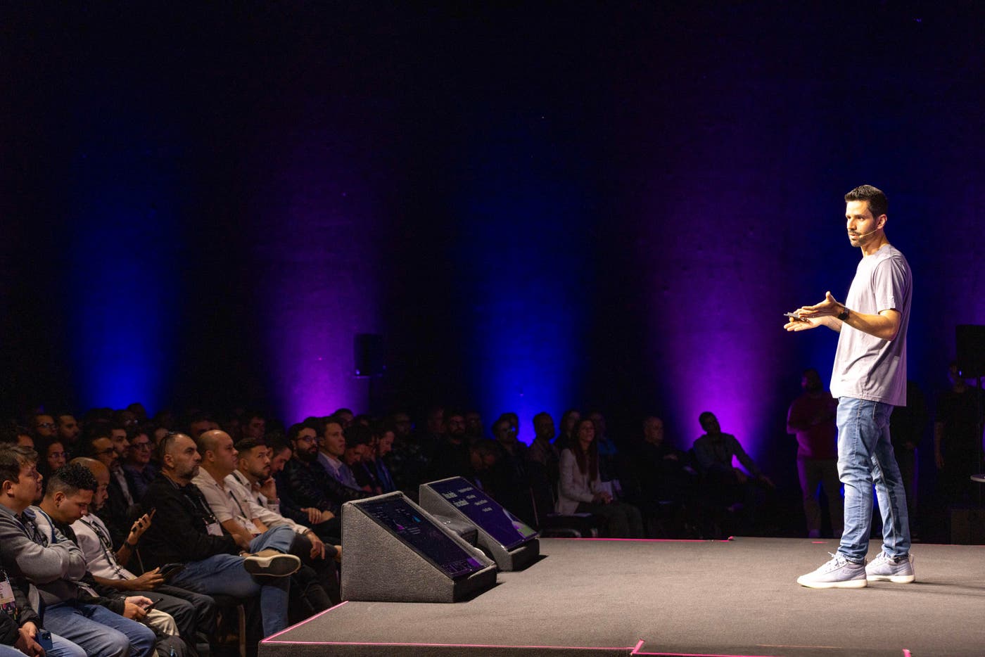 Presenter onstage at a Datadog Summit Presenter onstage at a Datadog Summit