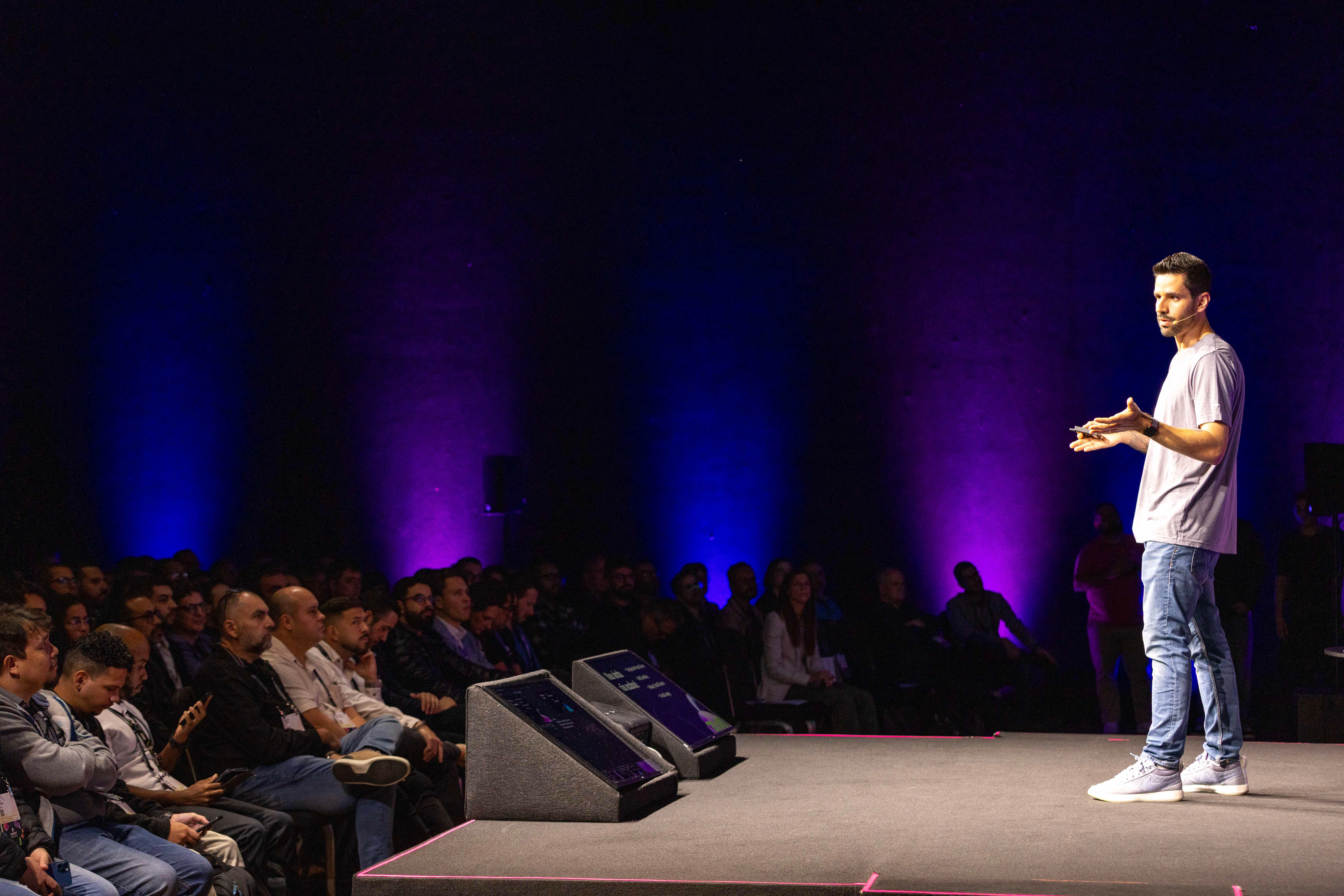 Presenter onstage at a Datadog Summit Presenter onstage at a Datadog Summit