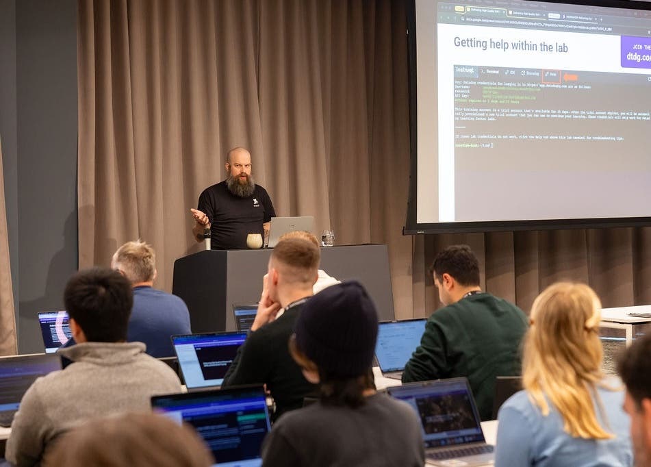 Presenter leading a workshop at a Datadog Summit Presenter leading a workshop at a Datadog Summit