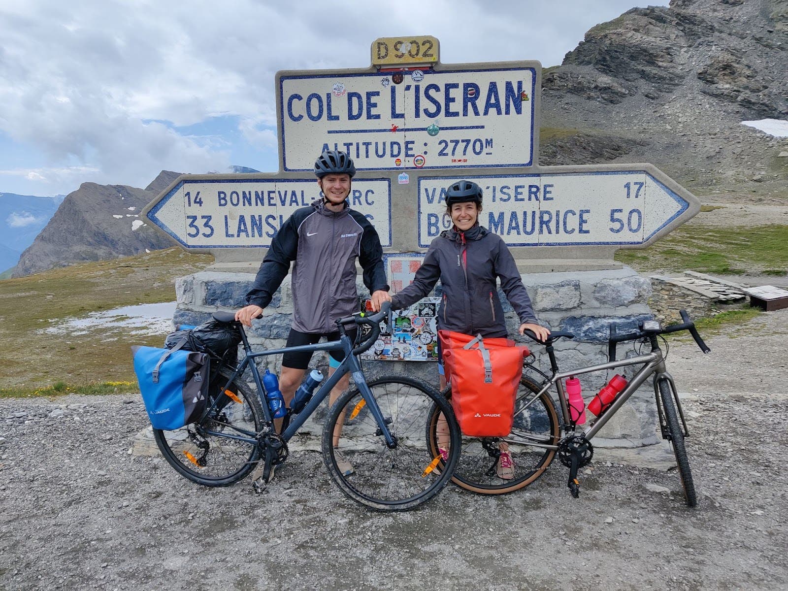 Marie-Laure and her husband biking up the Col de l'Iseran in the Route des Grandes Alpes. Marie-Laure and her husband biking up the Col de l'Iseran in the Route des Grandes Alpes.