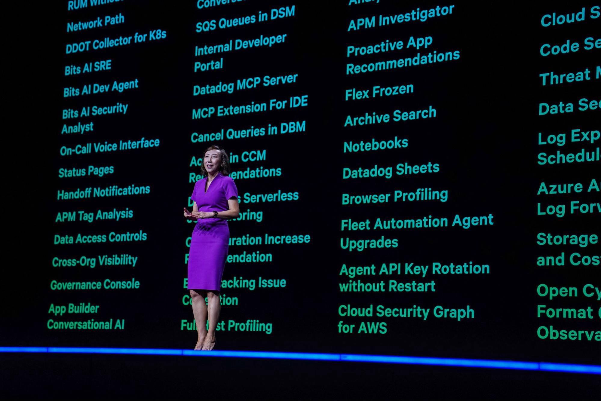 Photo of Datadog’s Chief Product Officer Dr. Yanbing Li speaking on stage at the DASH 2025 opening product keynote.